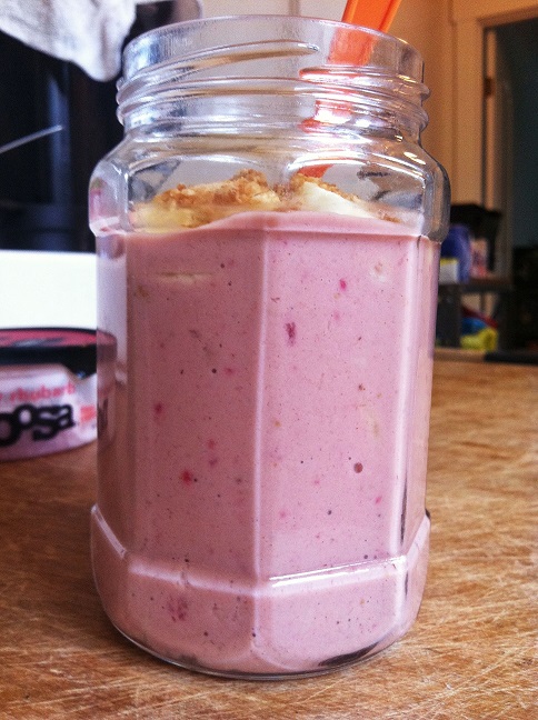 Strawberry Banana Smoothie Topped with Fresh Bananas and Granola | Cooking with a Wallflower